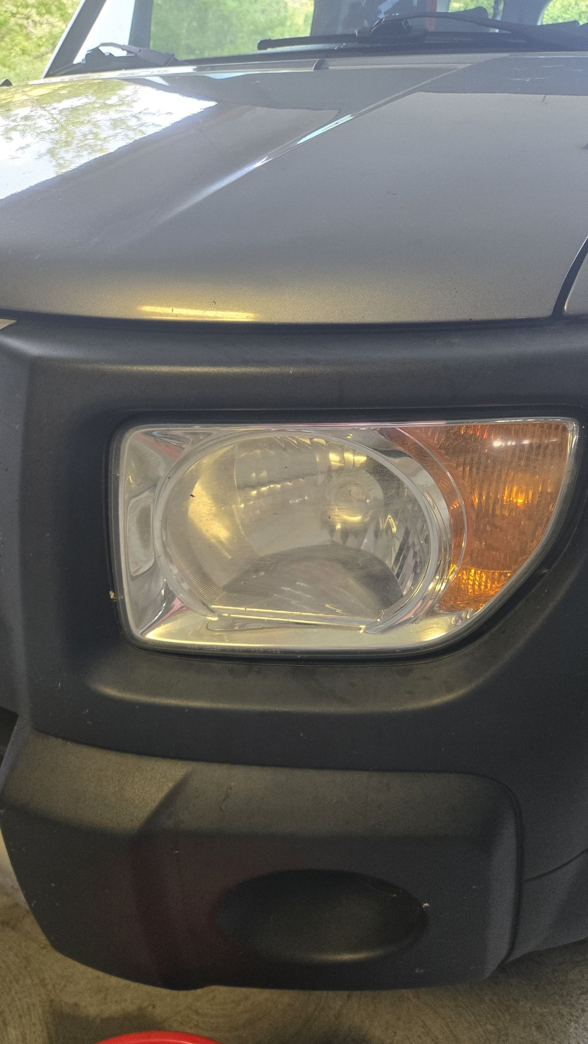 Before headlight restoration