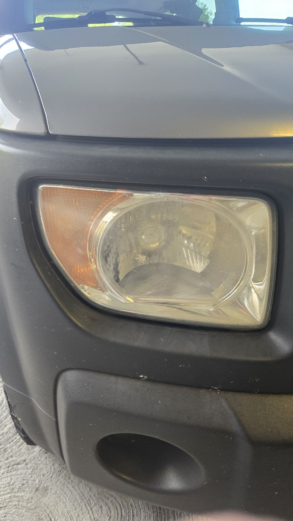 Before headlight restoration