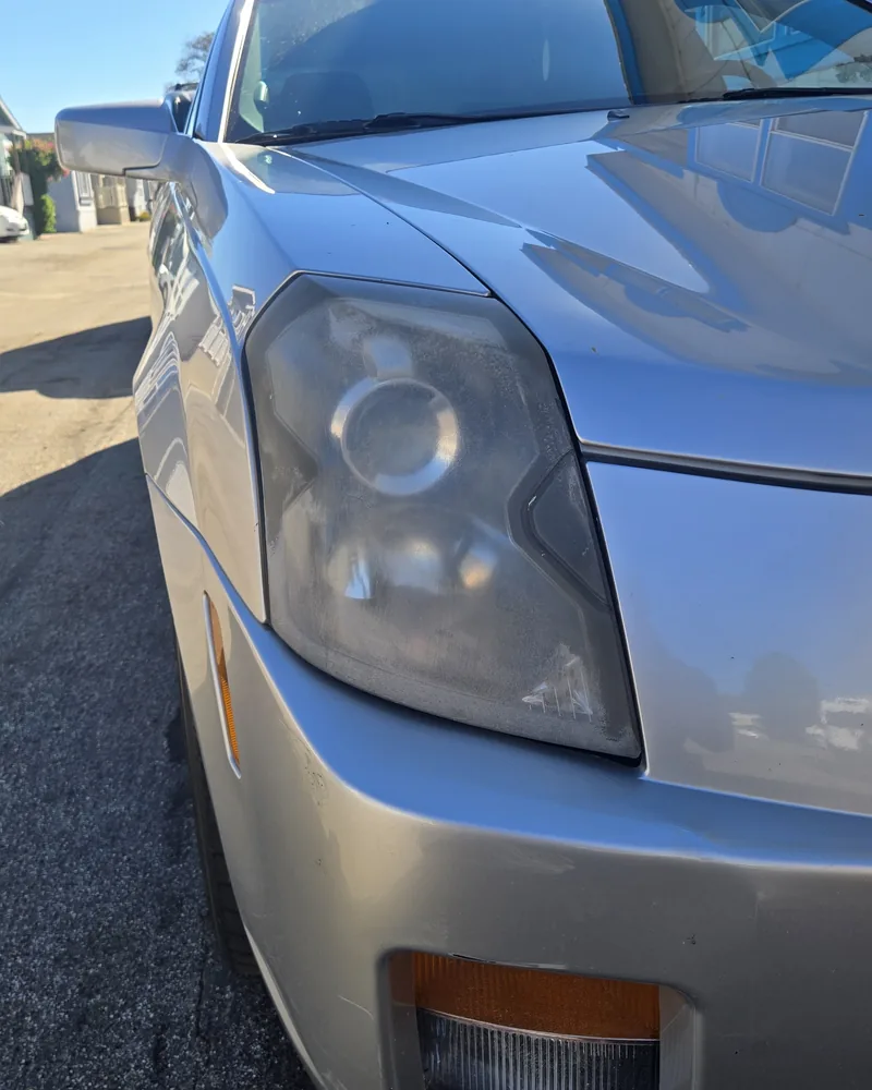 2007 Cadillac CTS headlight before restoration