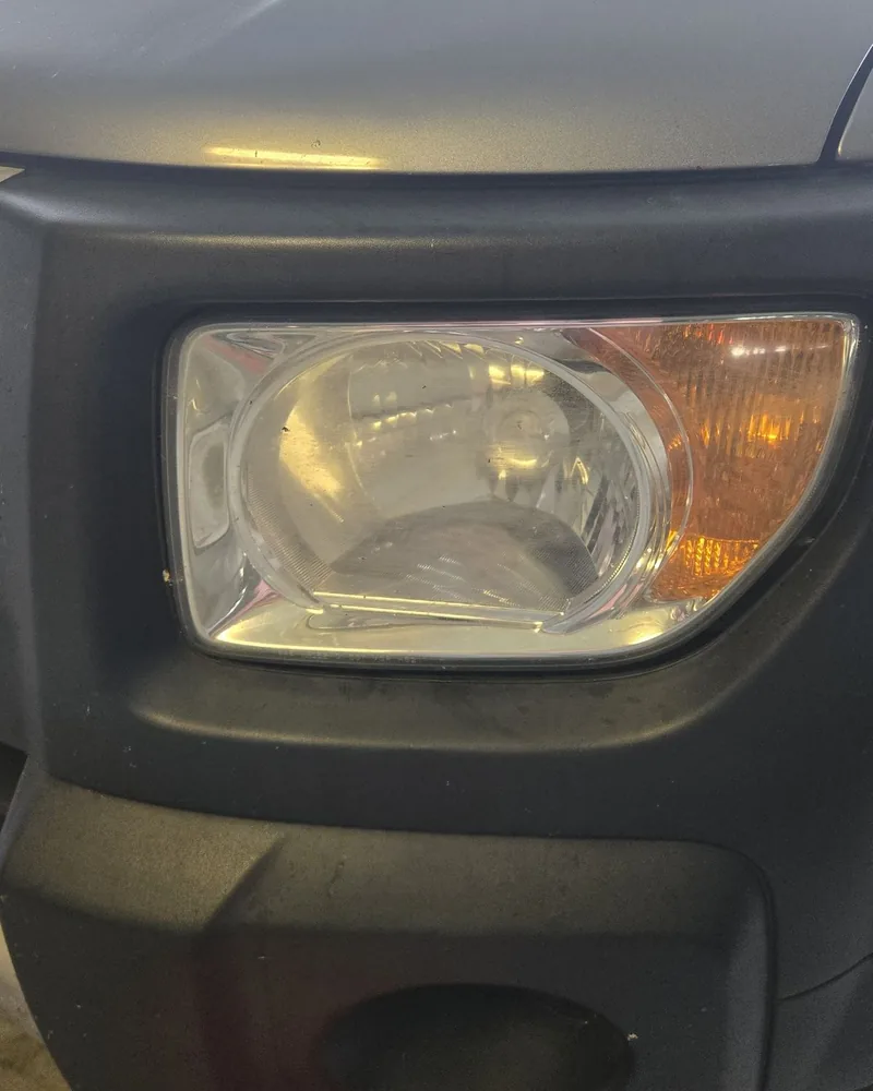 2007 Honda Element headlight before restoration